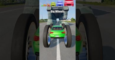 Voitures grandes et petites face au tunnel de pierre - BeamNG.Drive