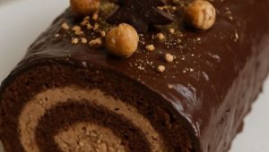 Découvrez la recette de la bûche choco-noisette de Florie du Cellier - ICI