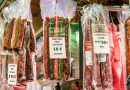 Spain, Barcelona, Mercat de la Boqueria, public market, sausage vendor display