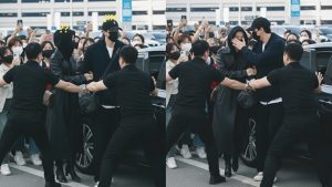 JIN de BTS protège une mystérieuse inconnue à l'aéroport !