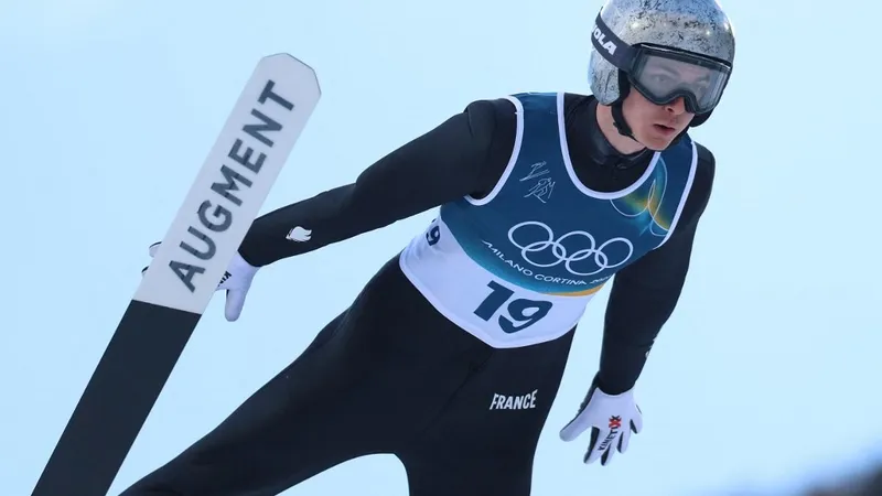 Marco Heinis sur le grand tremplin, le 17 février 2026 aux JO.