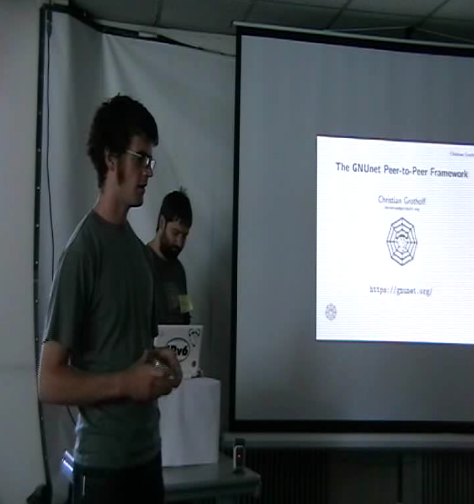 Andy Wingo Christian Grothoff ghm denhaag 2010.png
