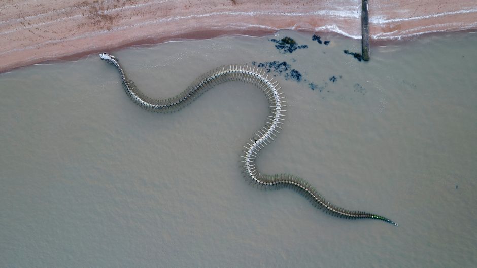 High angle view of a serpent sculpture on the beach in Saint-Brevin-les-Pins, France.