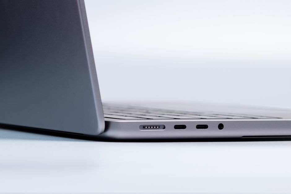 Close-up of a modern laptop's side showing ports and sleek design.