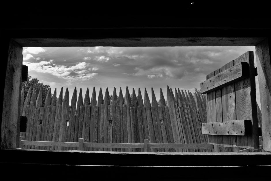 View of historic wooden fortification fence in Vonore, TN, captured in black and white.
