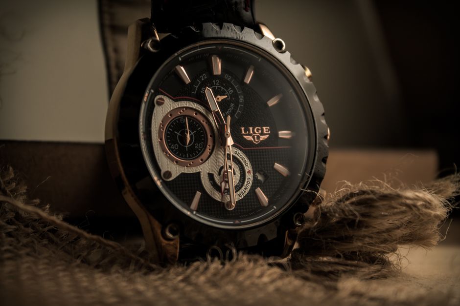 Detailed close-up of a luxury wristwatch with intricate dials and design.