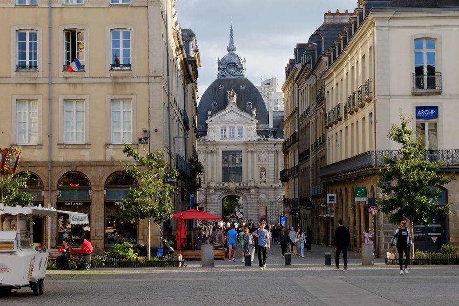 Explore the bustling streets of Rennes, France in this beautiful urban cityscape.