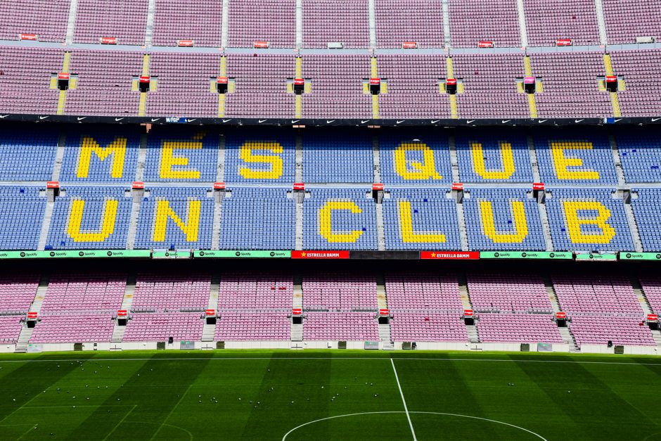 The iconic "Mes Que Un Club" slogan displayed at the Camp Nou stadium in Barcelona, Spain.