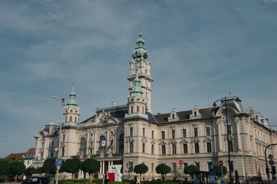 Beautiful day view of the historic Győr City Hall with clear blue sky in Hungary.