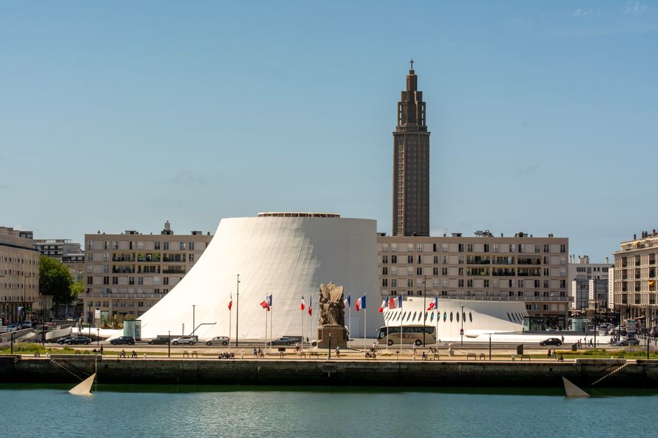Scenic view of Le Havre city with St. Joseph Church tower and iconic architecture.