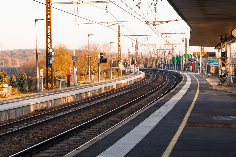 Peaceful railway station in Moret-Loing-et-Orvanne, Île-de-France, during daylight.