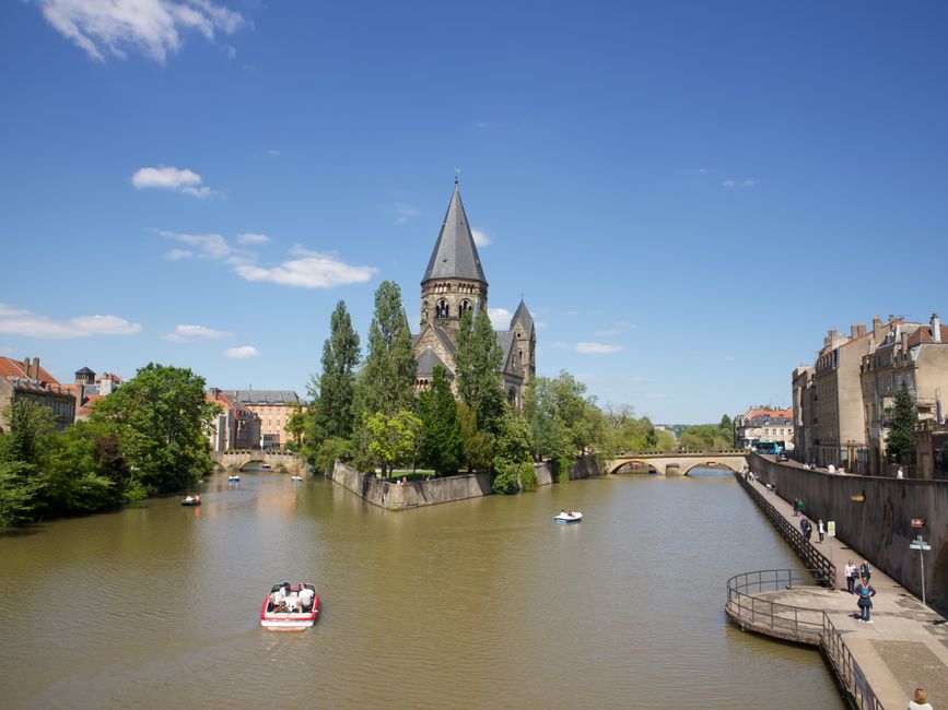 Beautiful view of Temple Neuf by the canal in Metz, France on a sunny day.