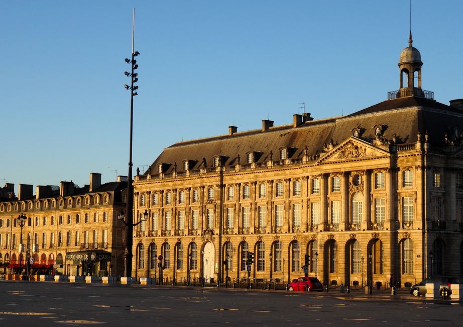 Elegant historic building in Bordeaux, France captured during golden sunset light, highlighting classic French architecture.