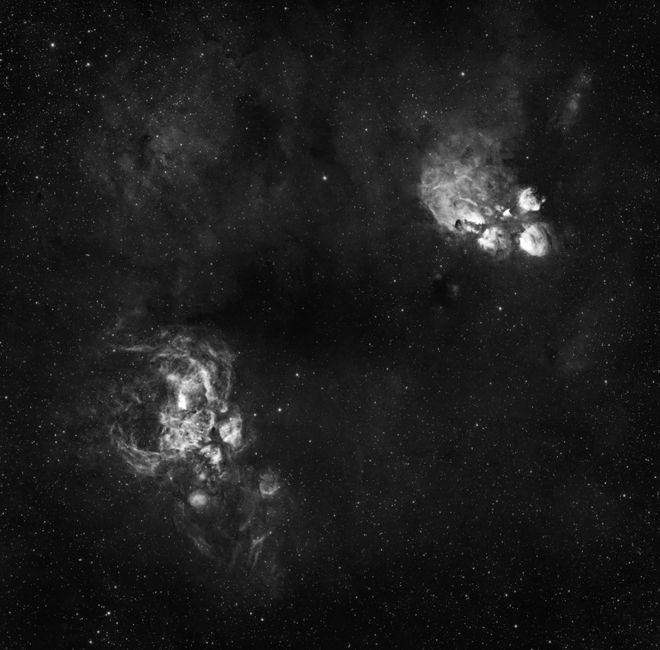 Black and white image of stars and nebulae in a dark sky, captured in Brazil.