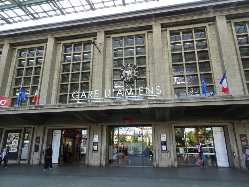 The elegant facade of Gare d'Amiens in France, displaying a classic architectural style.