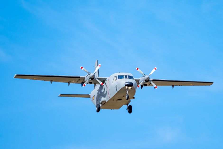 Twin engine military plane flying in the sky over Albacete, Spain.
