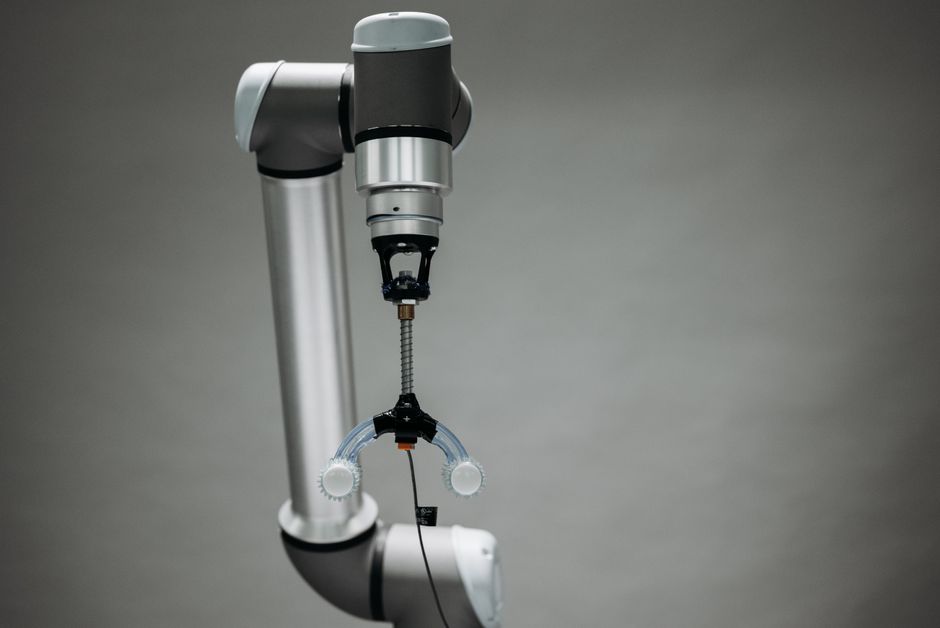 Close-up of an advanced robotic arm equipped with precision tools, showcasing technology and innovation.
